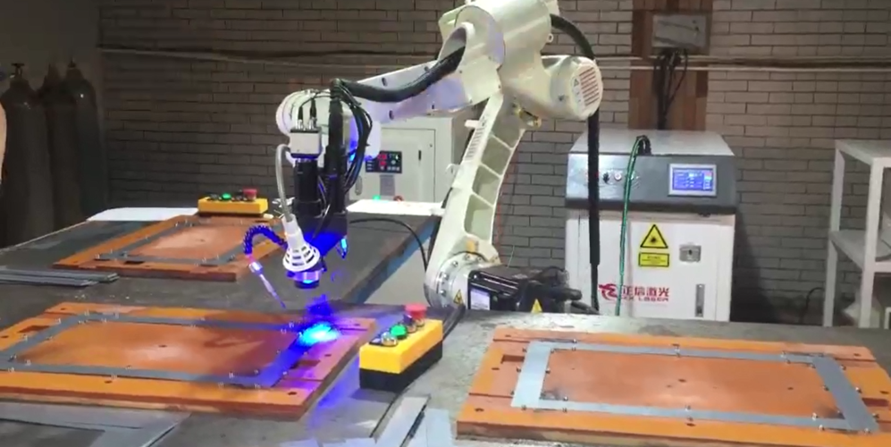 电子机器人双工位激光焊接机设备